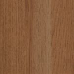 Close-up of warm brown wood with vertical grain pattern.